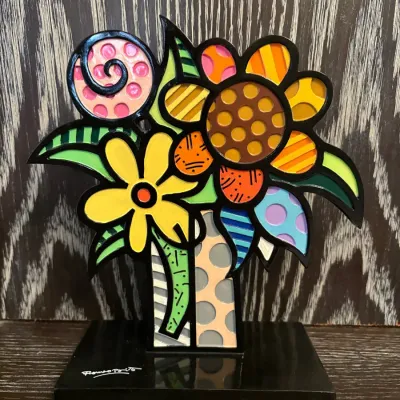 Sale Photo Thumbnail #58: Romero Britto floral pop-art table sculpture featuring vibrant colorful patterns on a black base.