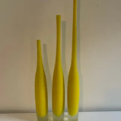 Sale Photo Thumbnail #55: Set of three graduated modern yellow art glass floor vases with clear bases.