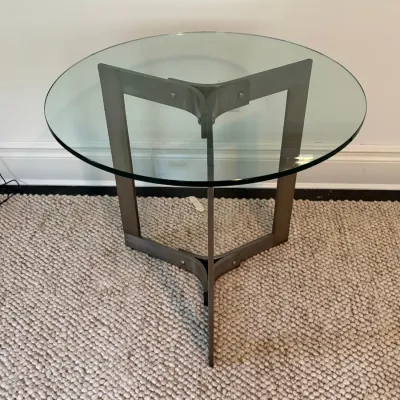 Sale Photo Thumbnail #54: Modern round glass-top side table with a tri-spoke brushed metal frame.