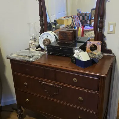 Sale Photo Thumbnail #72: Vintage dark wood dresser with attached wishbone-style swivel mirror, turned posts, and ornate brass hardware.