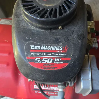 Sale Photo Thumbnail #88: Yard Machines by MTD front tine tiller featuring a 5.50 HP 195cc Tecumseh engine.