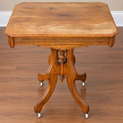 Antique Victorian Eastlake-Style Wooden Parlor Table on Casters