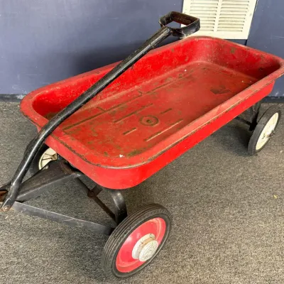 Vintage Red Metal Pull Wagon with Heavy-Duty Steerable Front Axle