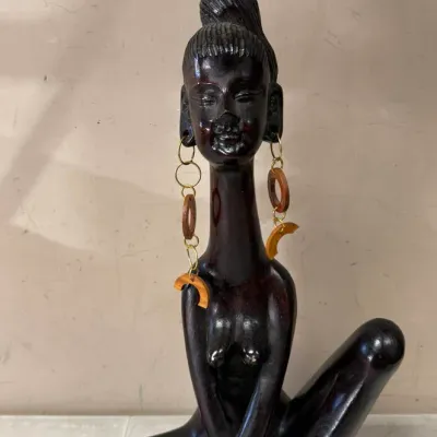 Hand-Carved Dark Wood Seated Woman Figurine with Earrings from Africa