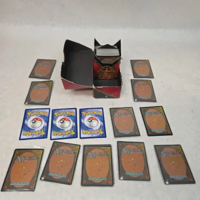Sale Photo Thumbnail #132: Small Collection of Magic The Gathering Cards w/ Die and 3 Pokemon Cards