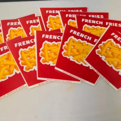 Grouping of Vintage MacCallum French Fries Advertising Signs