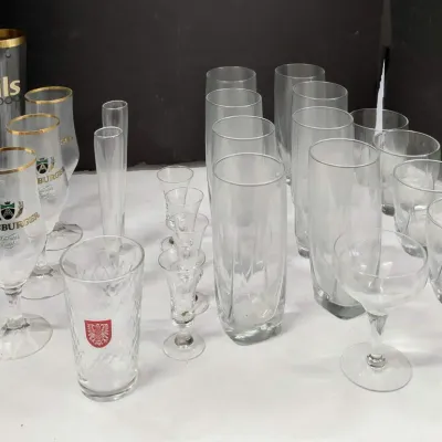 Glasses - 4 Pilsner, 3 Beer Glasses, 6 Cordial, 9 High Balls, 5 Low Balls, 1 Champagne