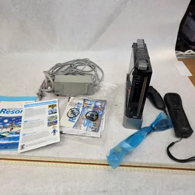 Used/Like New Wii w/ Controller, Nunchuck, Sensor, Power Cable, and Resort Game