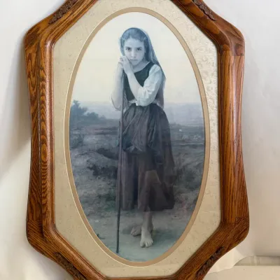 Framed Vintage Girl with Staff Portrait Art Print: Ornate Wood-Grain Frame