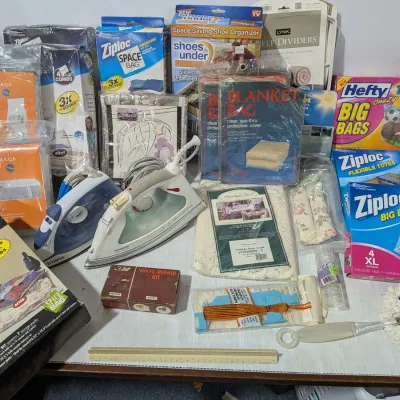 Assorted Kitchenware Lot: Ziploc Jumbo Bags, Clothes Bags, Mattress Bags, Irons, Lace Table Cover - Estate Sales Warehouse (GR)