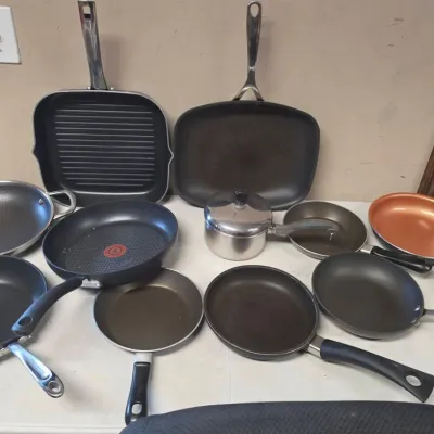 Large Assortment of Pans and Skillets - TFal, Farberware, and More