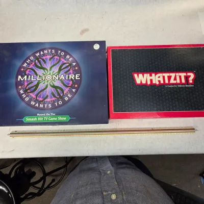 Used Like New Who Wants to Be a Millionaire and Whatzit Tabletop Board Games
