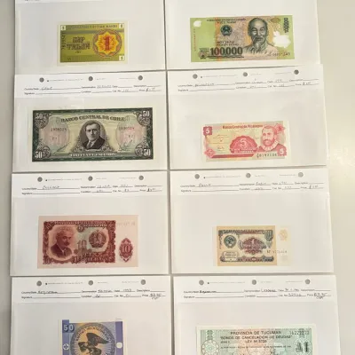 Lot of 8 - Scarce Mint Uncirculated World Currency - Description In Each Card