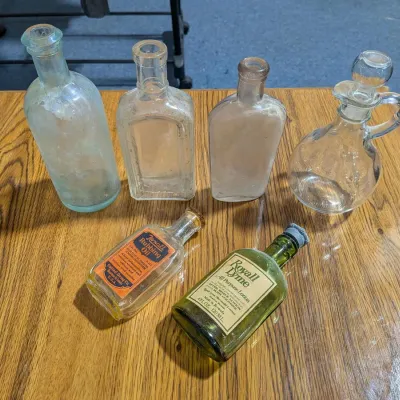 Antique Glass Bottles, Clear & Marked - Estate Sales Warehouse (GR)