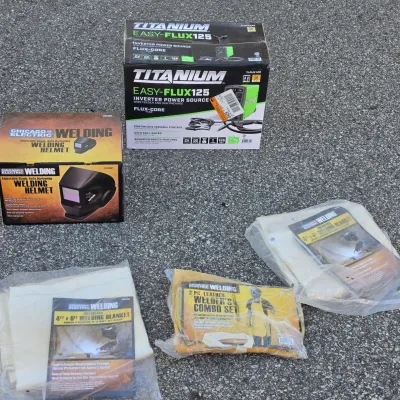 New in Box Titanium Easy Flux 125 Welder with Welding Helmet with Welder Blankets