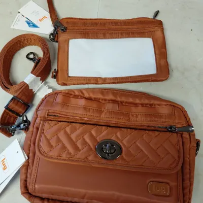 New Lug Switch Convertible Crossbody bag and Lug Peekaboo Convertible Wristlet - Copper Brown