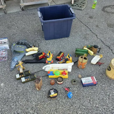 Tote of Vintage Toys and Collectibles - Charles Chips Tin, Watering Can, NASCAR Model Kits