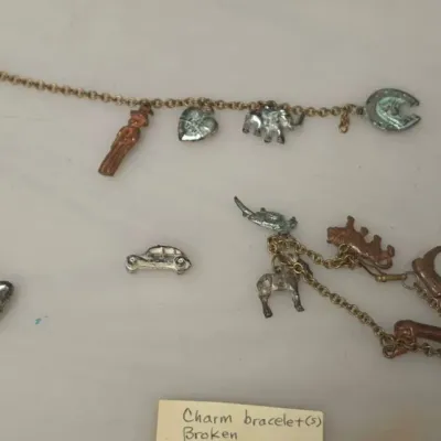 Grouping of Charm Bracelets and Figural Charms, Late 1950s