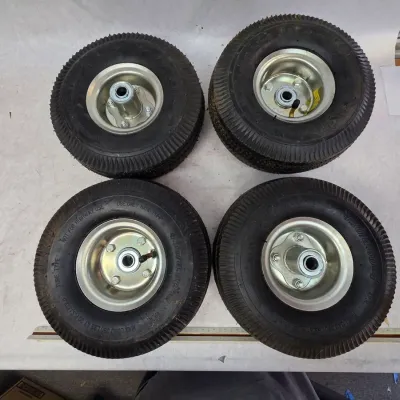 Set of 4 Like New 4.10-3.50-4 Tires
