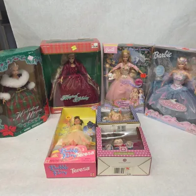Collection of 7 Vintage Barbie Dolls