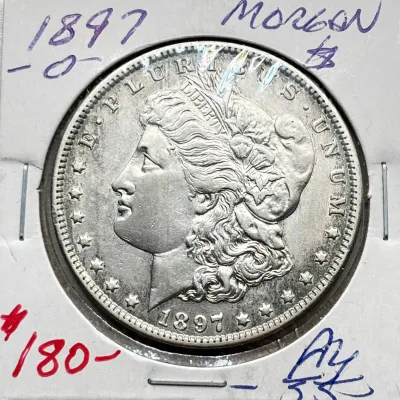 1897 O - Morgan Silver Dollar - AU55