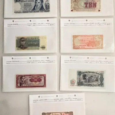 Lot of 7 - Mint Uncirculated World Currency - Description In Each Card