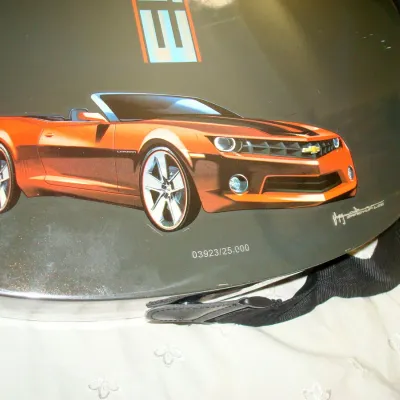 Esteban guitar with a Chevrolet Camero sports-car graphic