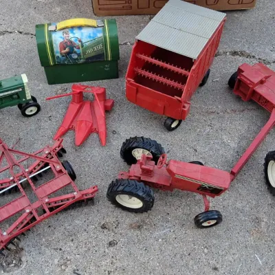 Sale Photo Thumbnail #10: Small Collection of Vintage Metal John Deere Tractor Toys