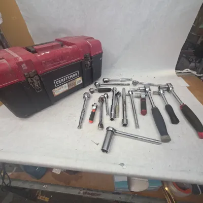 Large Collection of Various Sized Sockets in Black Craftsman Toolbox