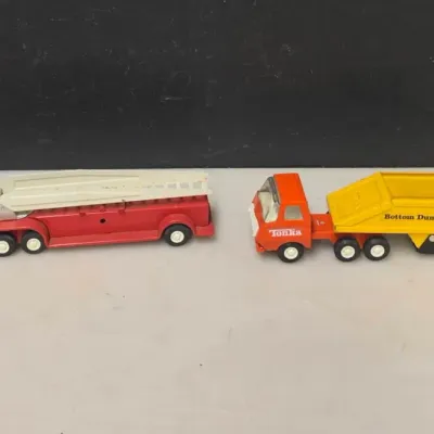 Pair of Vintage Tonka Trucks: Fire Ladder and Bottom Dump Semi