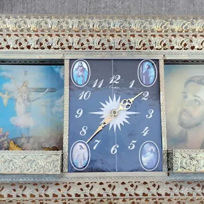 Ornate Religious Wall Clock with Decorative Gold-Tone Frame