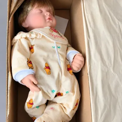 Ashton-Drake Disney Winnie the Pooh September Birthstone Dreamer Sleeping Baby Doll â€“ Boxed - Potterville