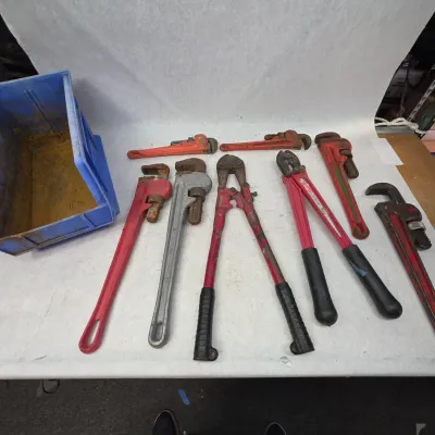 Collection of Various Sized Pipe Wrenches and Bolt Cutters
