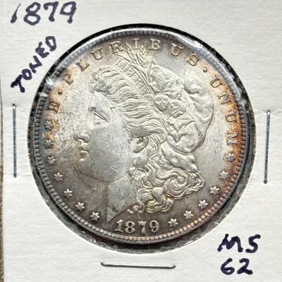 1879 - Morgan Silver Dollar - MS62 - Toned