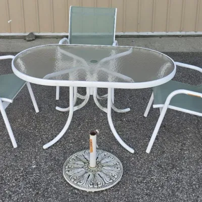 Glass Topped Patio Table with 3 Chairs and Umbrella Stand