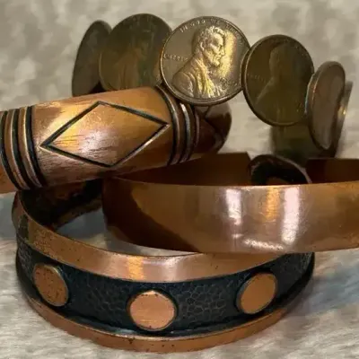 Sale Photo Thumbnail #59: Four Copper Bracelets