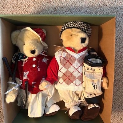 Sale Photo Thumbnail #81: Pair of VanderBear golf-themed collectible teddy bears dressed in patterned sweaters, hats, and golf accessories.