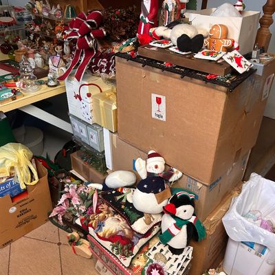 Sale Photo Thumbnail #44: Collection of holiday decorations, including plush snowmen, gingerbread ornaments, Santa figurines, and needlepoint pillows.