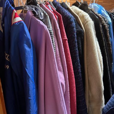 Sale Photo Thumbnail #74: Selection of vintage women's coats and jackets, including wool overcoats, faux fur, tweed, and casual athletic outerwear.