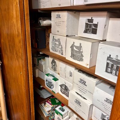 Sale Photo Thumbnail #29: Collection of Department 56 Heritage Village Series items in original boxes, including New England Village Series buildings.