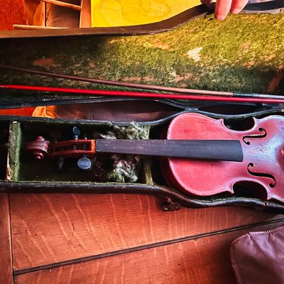 Sale Photo Thumbnail #60: Vintage violin with bow in a green plush-lined hard case.