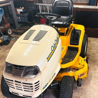 Sale Photo Thumbnail #15: Cub Cadet GT 2550 heavy-duty shaft drive lawn tractor in yellow and off-white.