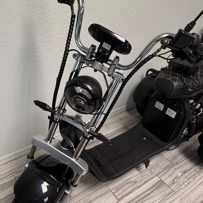 Sale Photo Thumbnail #433: This is known as the Shansu CP-3, or CityCoCo Trike Variant. It has  high-torque differential brushless motor setup. It has an estimated range of 25-35 miles with a full charge, and can reach speeds of 25-30mph. Includes charger, an extra set of keys, and