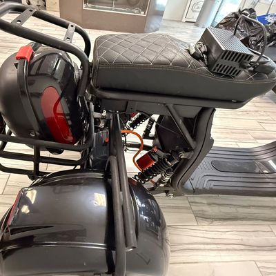 Sale Photo Thumbnail #437: This is known as the Shansu CP-3, or CityCoCo Trike Variant. It has  high-torque differential brushless motor setup. It has an estimated range of 25-35 miles with a full charge, and can reach speeds of 25-30mph. Includes charger, an extra set of keys, and