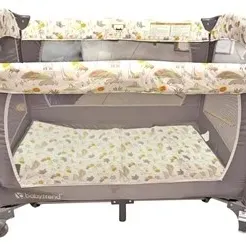 Baby Trend portable playard featuring a grey mesh frame with patterned top rails and a matching padded mattress insert.