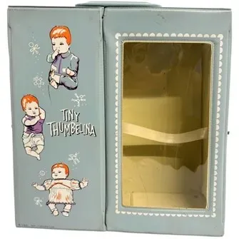 Vintage 1960s Ideal Tiny Thumbelina light blue vinyl doll carrying trunk with display window and illustrated cover.