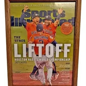 Framed Sports Illustrated 2017 World Series Commemorative Issue cover featuring the Houston Astros in a classic wooden frame.