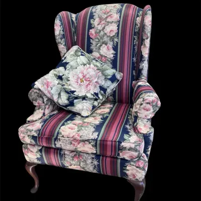 Vintage Floral Patterned Wing Back Armchair With Queen And Style, Cabriole Legs, And A Matching Acce