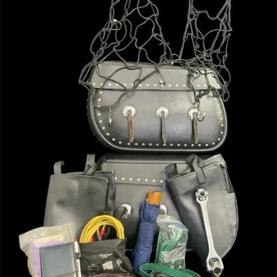 Pair Of LeatherLyke Motorcycle Saddlebags Filled With Misc. Items 