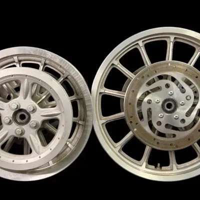 Pair Of 13-Spoke Silver Mag Wheels w/ OEM 4415600 Brake Rotors